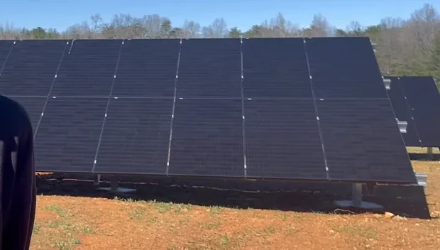 Bifacial solar panels mounted on racks
