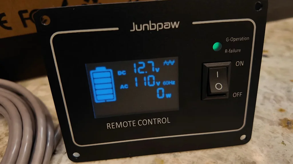 Remote control display showing output voltage and frequency