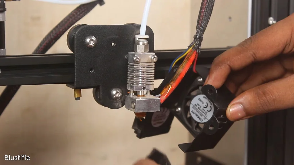 Cleaning the nozzle and inspecting the PTFE tube