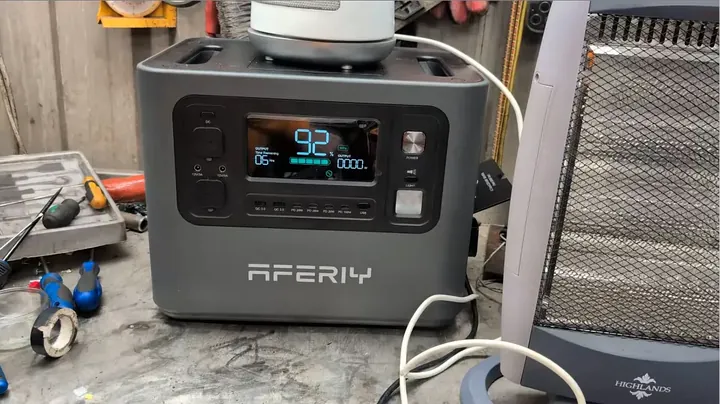 Multimeter screen showing AC voltage sagging down to 194.5 volts under severe load