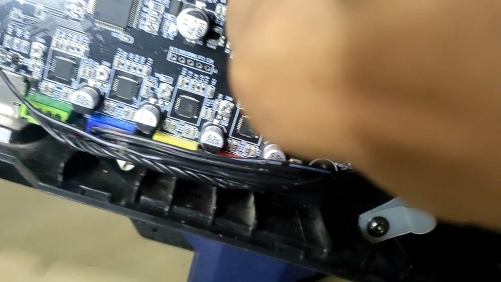 Hand connecting wires to the mainboard PCB