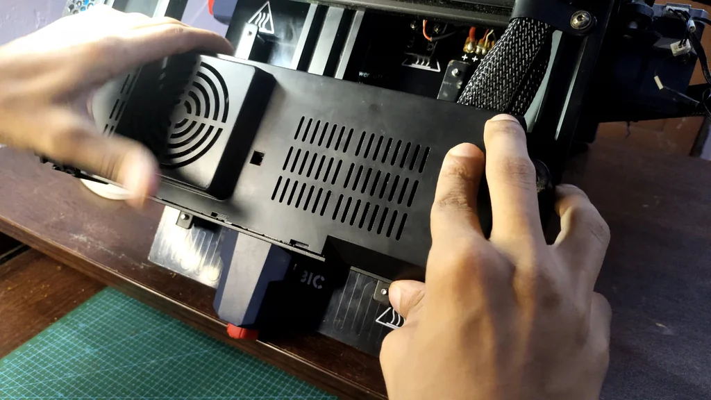 Attaching the printer cover during electronics assembly
