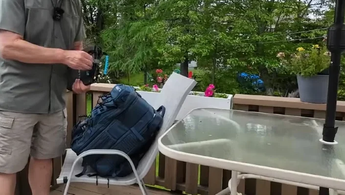 Man packing the folding solar panel