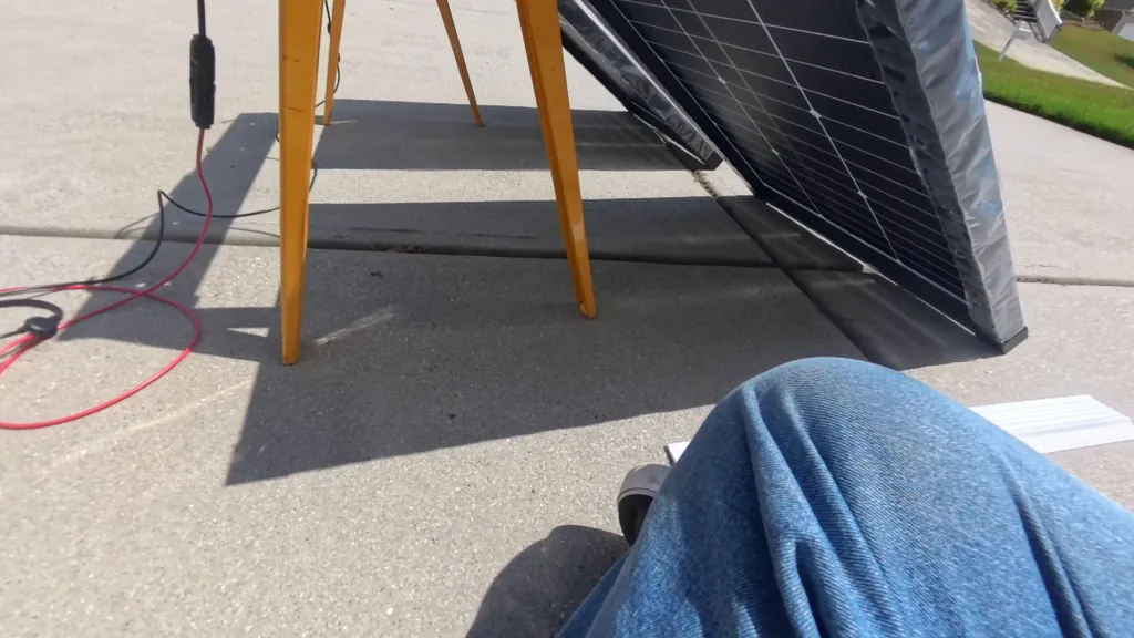 Solar panels mounted at a 30-degree angle on the driveway