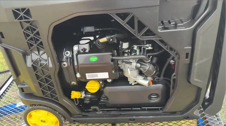 Detailed view of internal small engine components inside generator casing