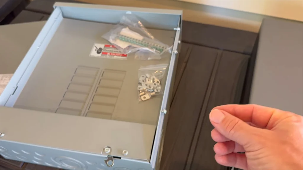 Multimeter testing the Anker Solix home power panel terminals
