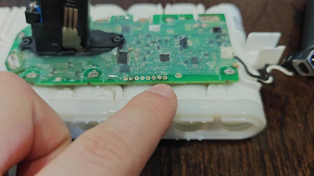 Hand holding Raspberry Pi computer
