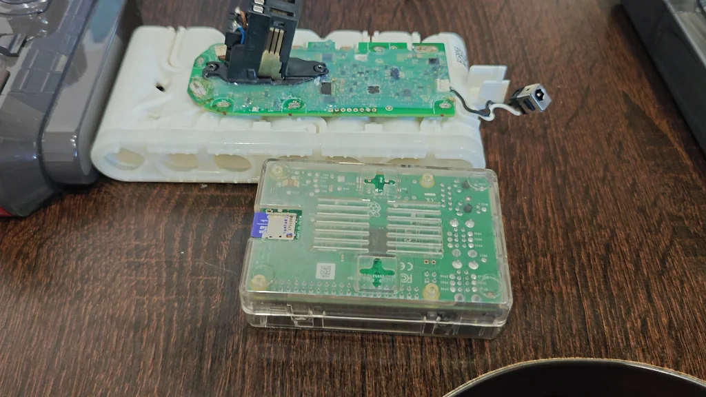 Hand holding Raspberry Pi computer