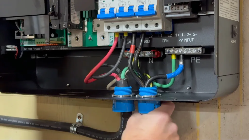 Battery cable connection point with cover removed.