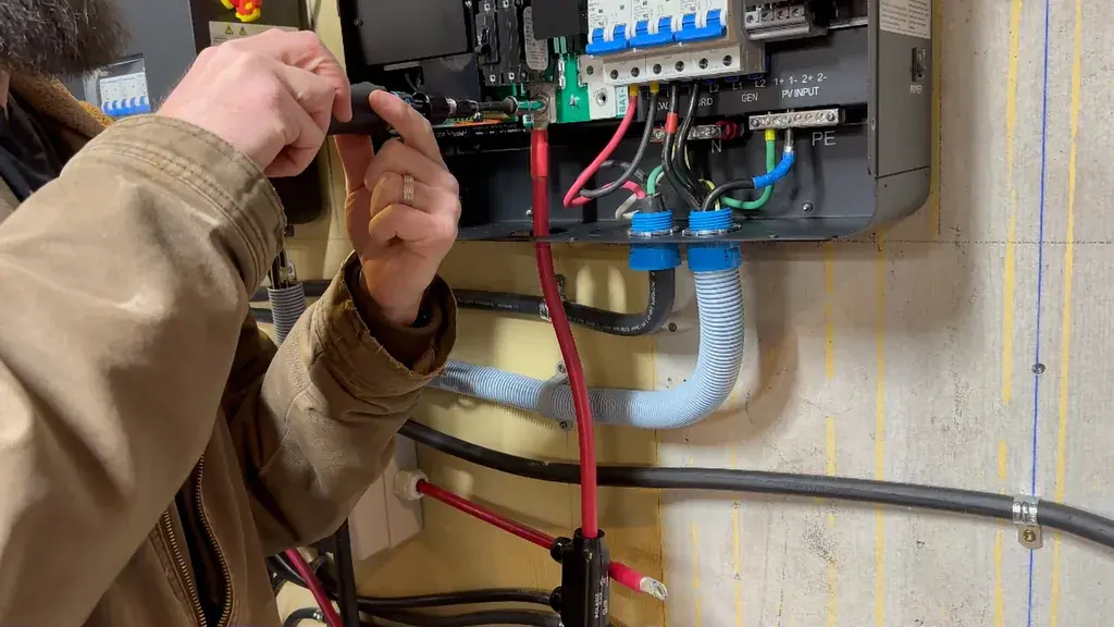Battery terminals showing positive and negative cable routing.
