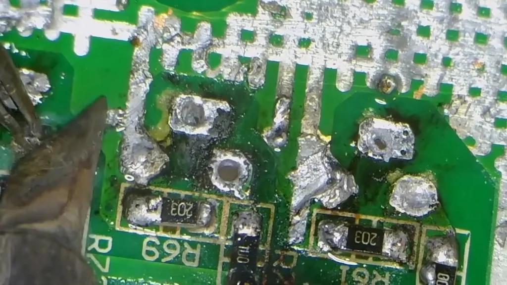 Desoldered PCB components and cleaning process
