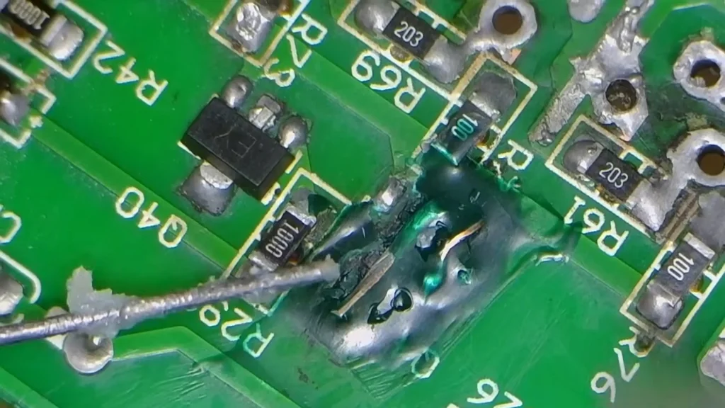 PCB component soldering repair close-up