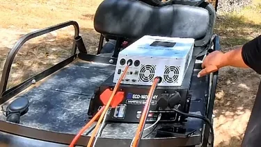 Battery cables being connected with a torque wrench