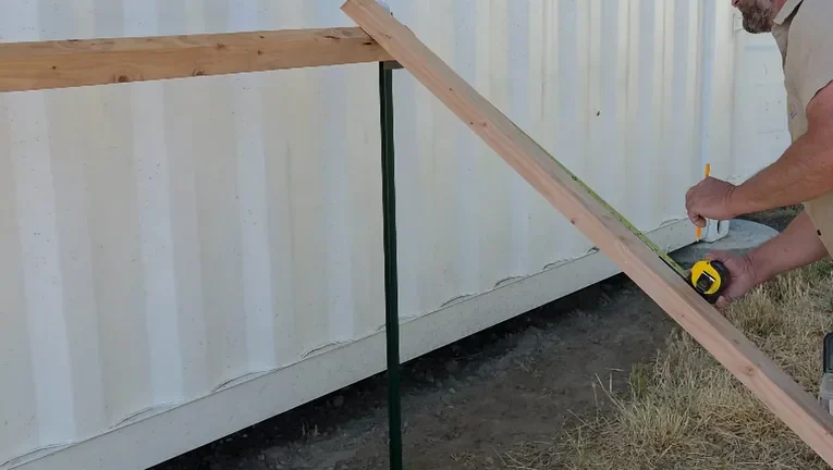 Stack of Renogy solar panel boxes used for measuring dimensions.
