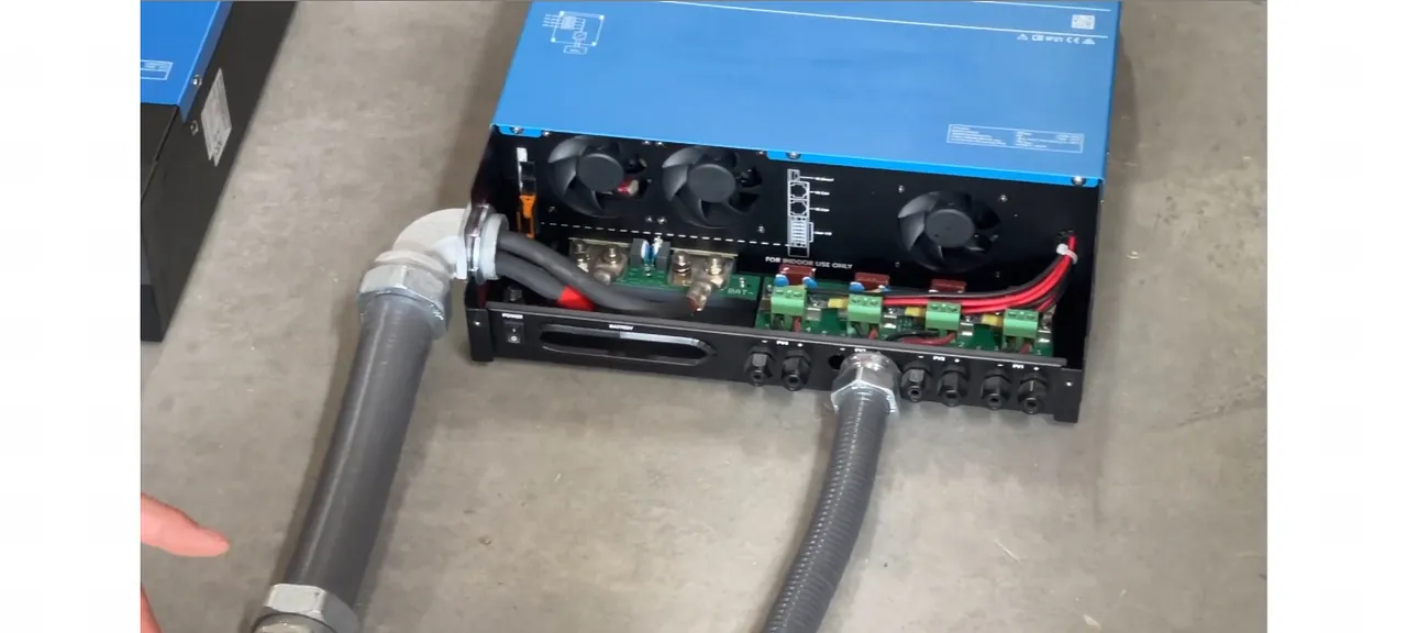 Close-up of the MC4 connector interface on the unit