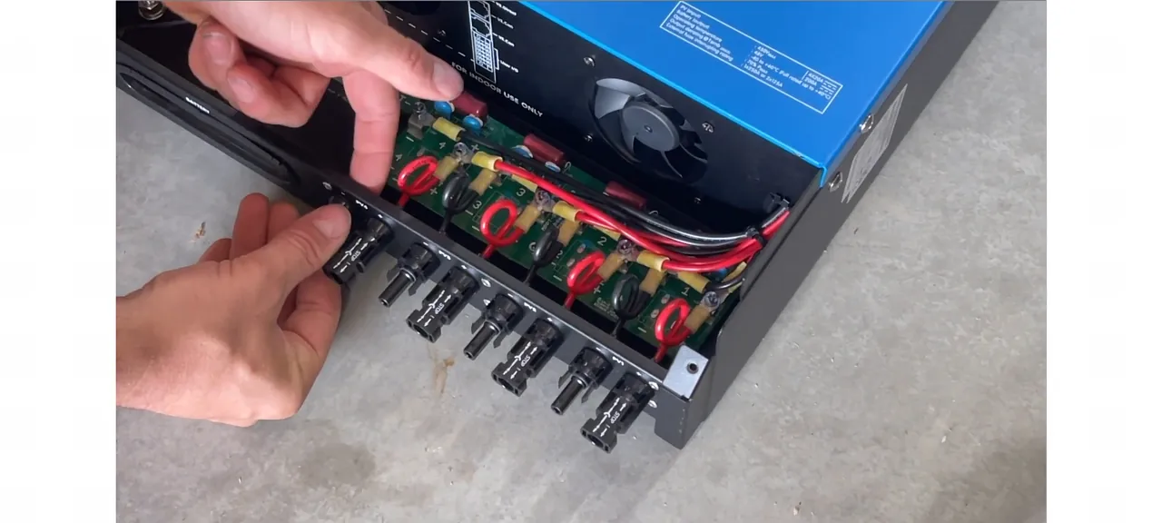 Internal view of the unit showing terminal nuts and wiring