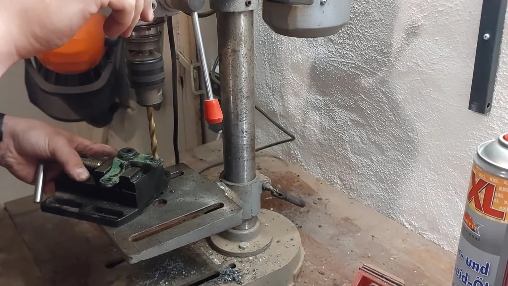 Drilling metal part with drill press