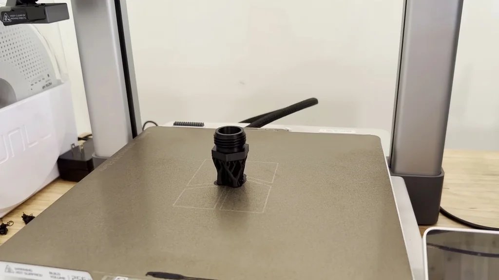 3D printed threaded part on print bed