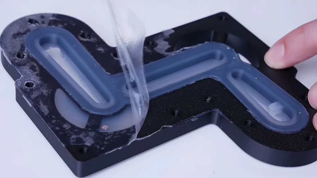 Peeling protective film from silicone gasket