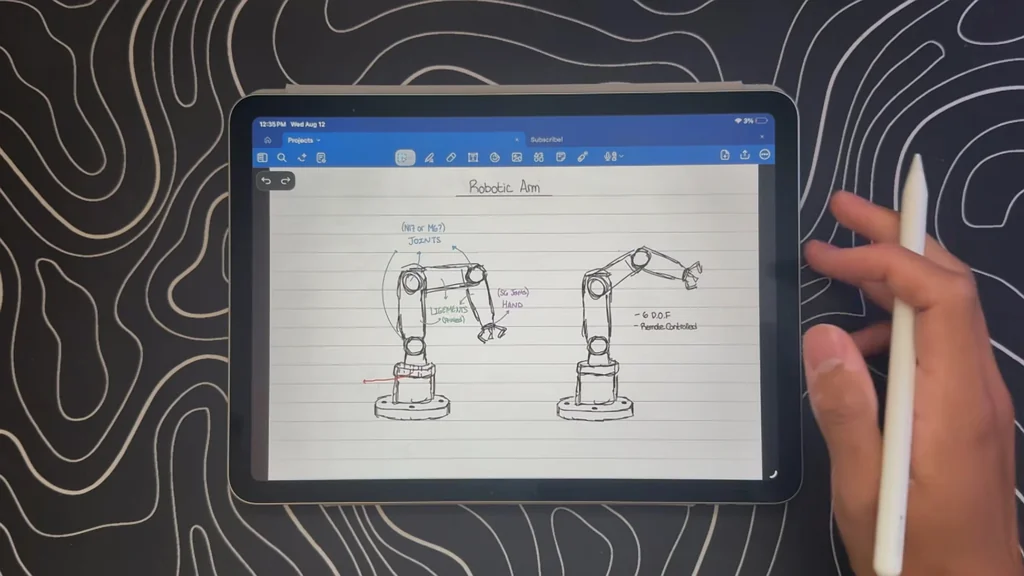 Sketching the robotic arm base design on a tablet