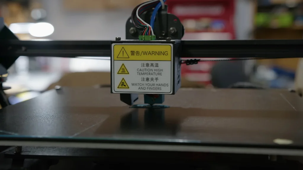 Filament extruding on the bed