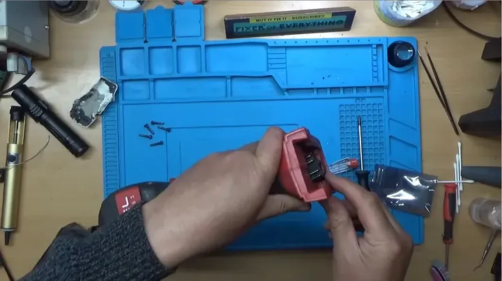 Reinstalling trigger and battery terminal alignment into plastic tool housing