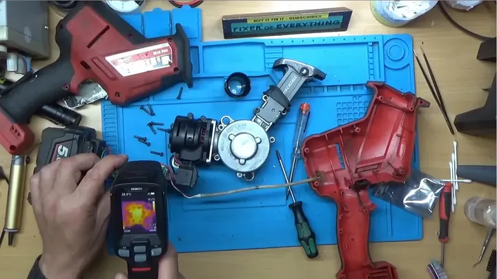 Thermal camera display showing hot spot on damaged microcontroller IC