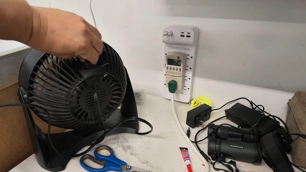 Desk fan and power strip setup