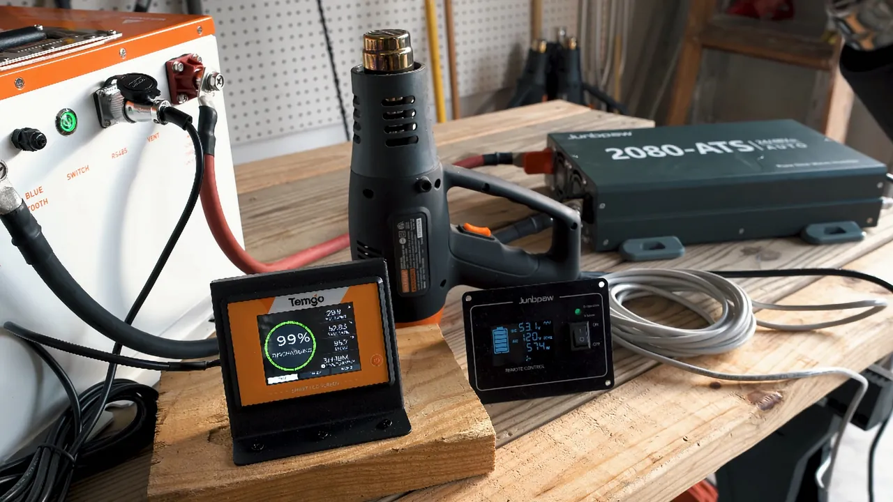 Parallel battery wiring configuration on the workbench.