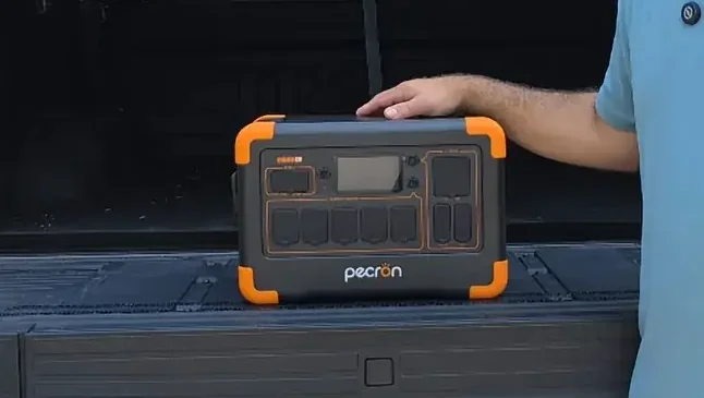 Pecron E1000LFP unit sitting inside its shipping box with accessories.