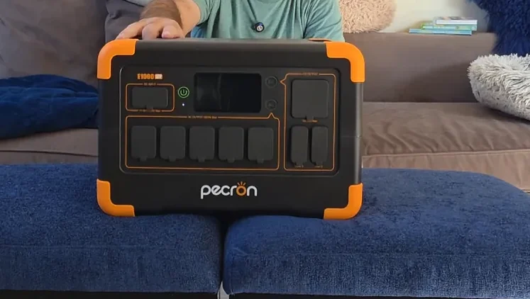 Solar input port and charging cable connected to the Pecron unit.