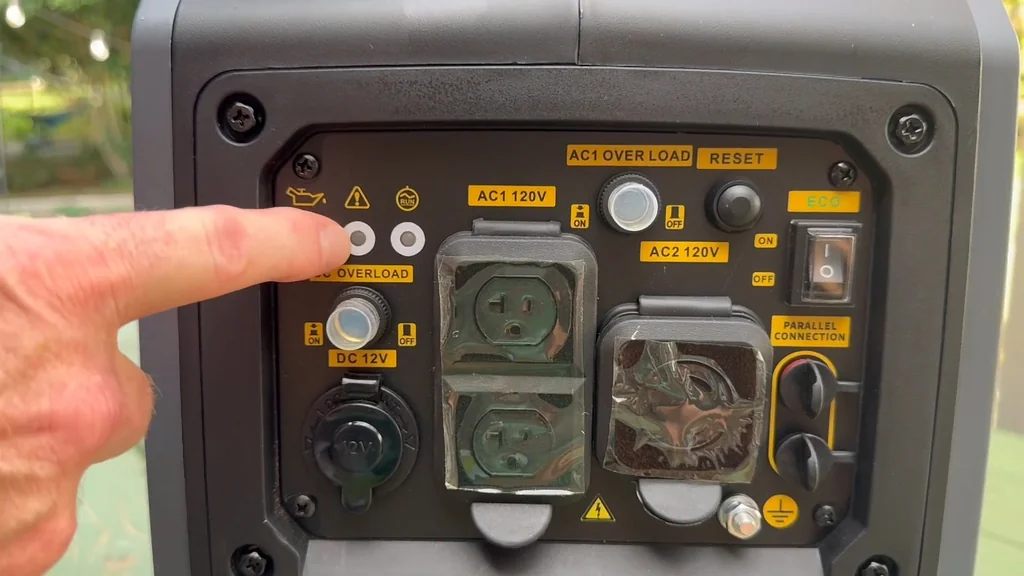 Man pointing at the generator control panel