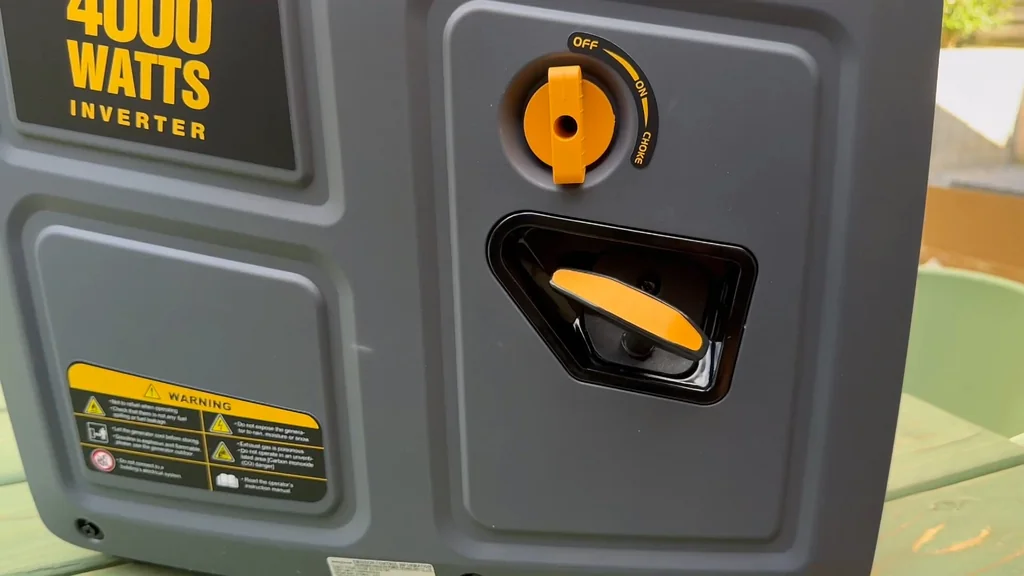 Man operating the choke and pull start