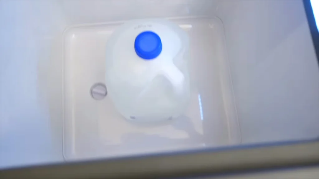 Water jug inside the portable fridge unit