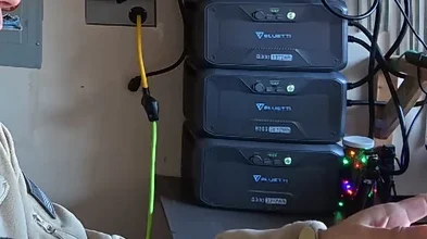 Man looking at BLUETTI power stations