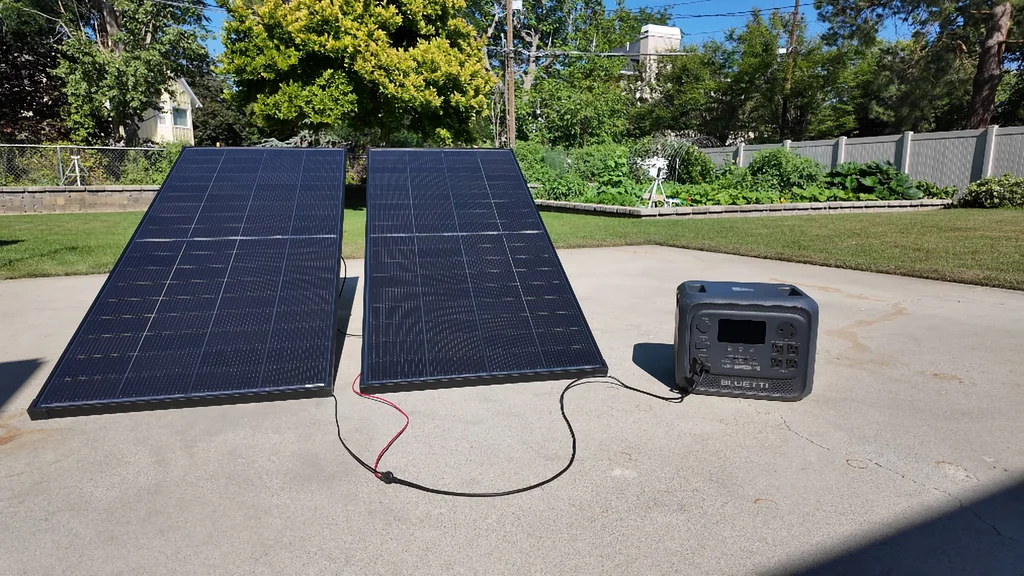 Solar panels connected to a Bluetti power station