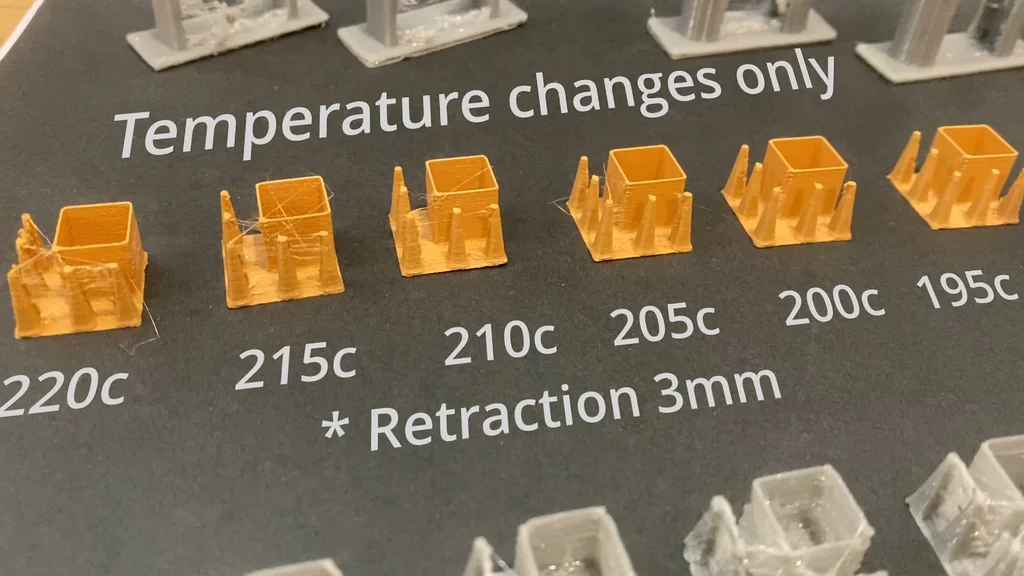 Labeled 3D printer temperature stringing tests