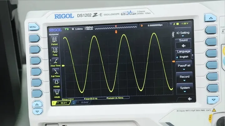 Oscilloscope displaying a clean sine wave during inverter load testing.