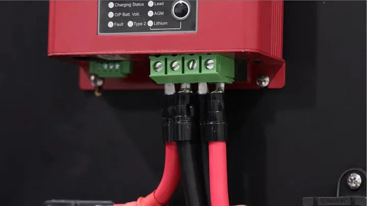 Close-up of wiring terminals on an electrical component, showing neatly inserted wires secured in place.