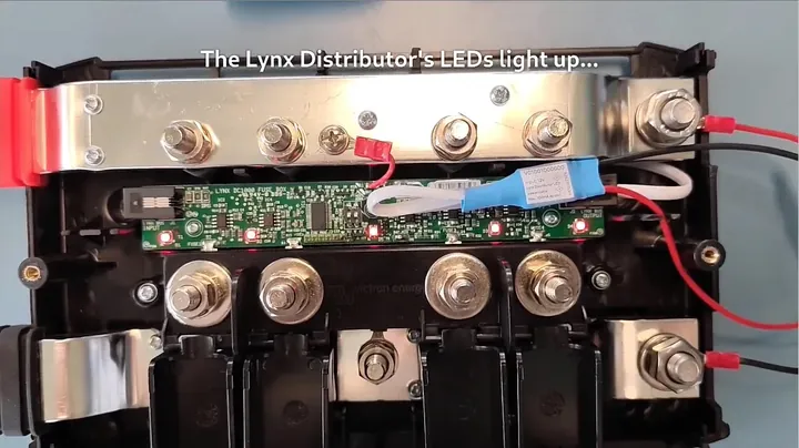 Attaching the power cable ring terminals to the positive and negative studs