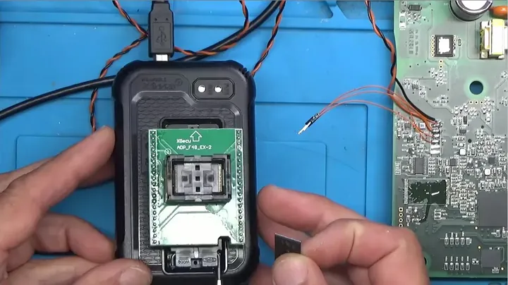 Placing the extracted flash chip into the XGecu T48 programmer adapter