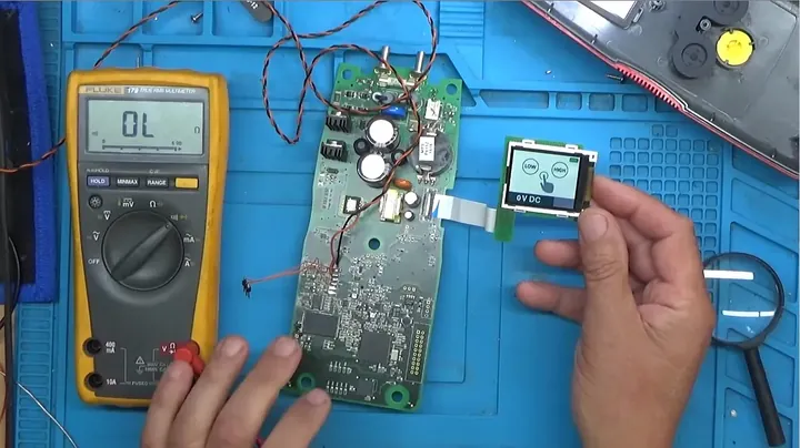 Assembled transmitter circuit board alongside the receiver display